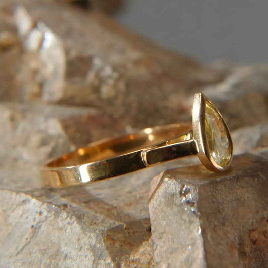 18K gold ring with pear-shaped yellow sapphire, luxury Eclat d'or jewelry on stone