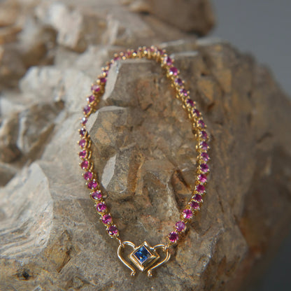 Collier en Or 18K – Grenats et Saphir, une touche de couleur